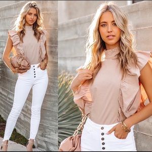 I am selling this brand N E W top from Vici!